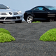 Illustration for article titled Strange Alien Plant-Men Photographed Sneaking Up On Mercedes-McLaren SLRs